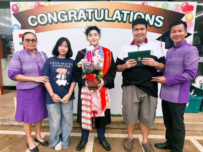 Namteo posing with her degree certificate